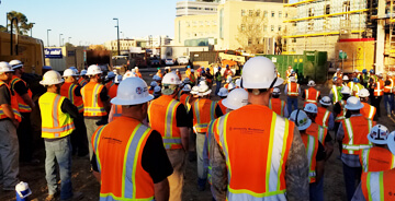 UMEC-CA crew in safety hats and vests